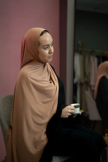 Portrait in a warm-toned hijab by Hailsh Creative